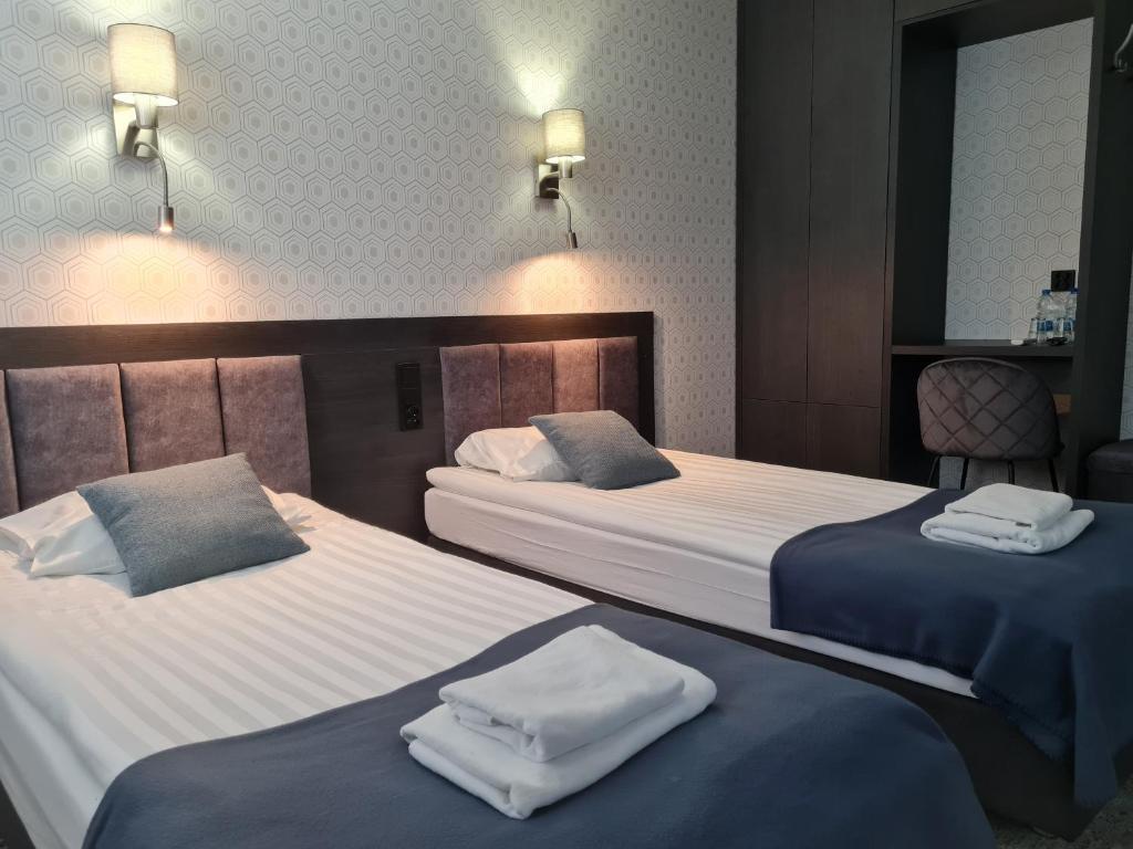 Двухместный (Улучшенный двухместный номер с 2 отдельными кроватями) гостевого дома Pensjonat Retro, Ломжа