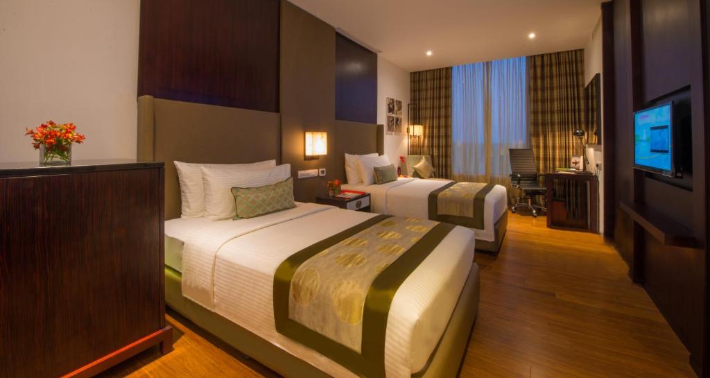 Сьюит (Двухместный номер «Премиум» с 2 отдельными кроватями) отеля The Gateway Hotel Airport Garden by Taj, Негомбо