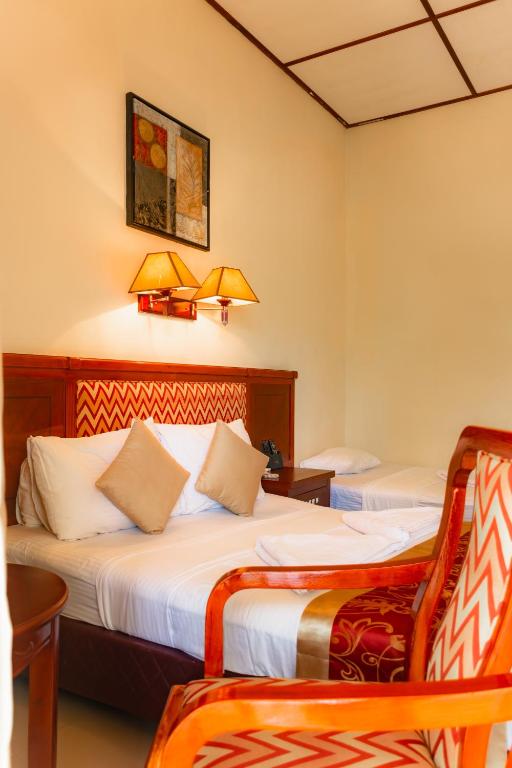 Двухместный (Двухместный номер Делюкс с 1 кроватью или 2 отдельными кроватями) отеля Heritage Hotel, Анурадхапура