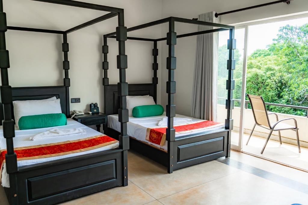 Двухместный (Двухместный номер с 2 отдельными кроватями) отеля Heritage Hotel, Анурадхапура