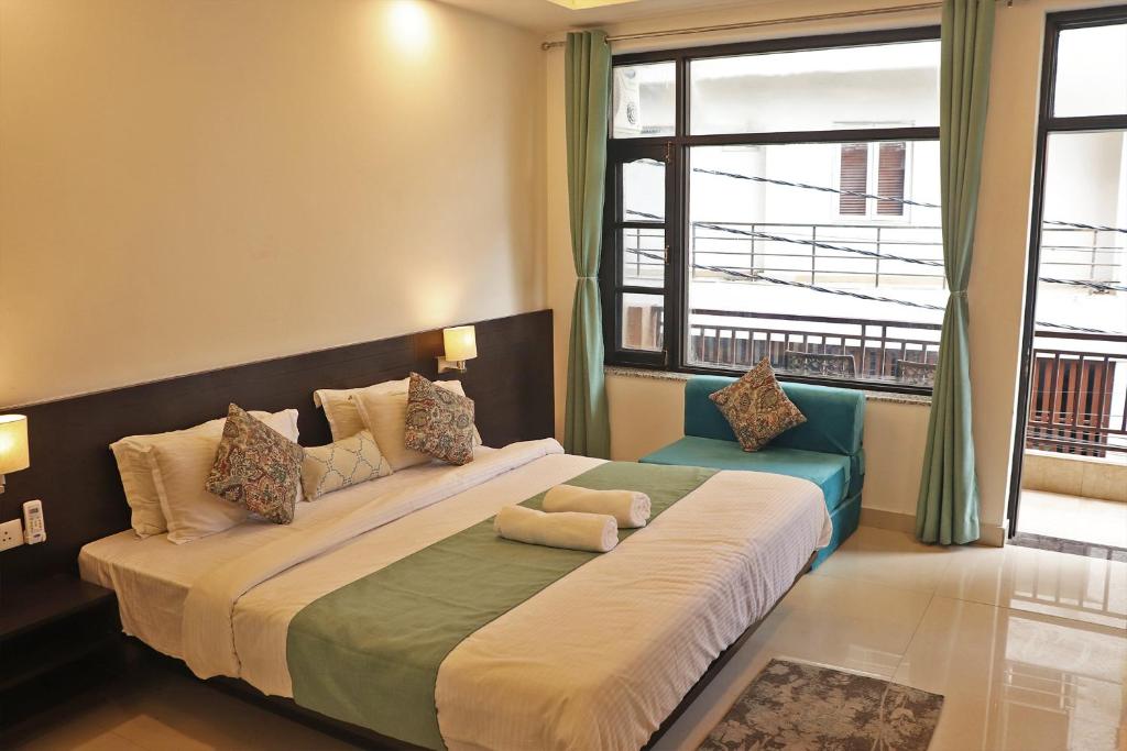Трехместный (Трехместный номер) отеля Fantastic ALOHA Ganga Front, Ришикеш