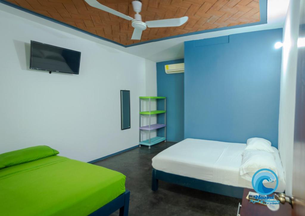 Двухместный (Двухместный номер с 2 двуспальными кроватями) гостевого дома Hostal Azul y Blanco, Санта-Крус-Хуатулко