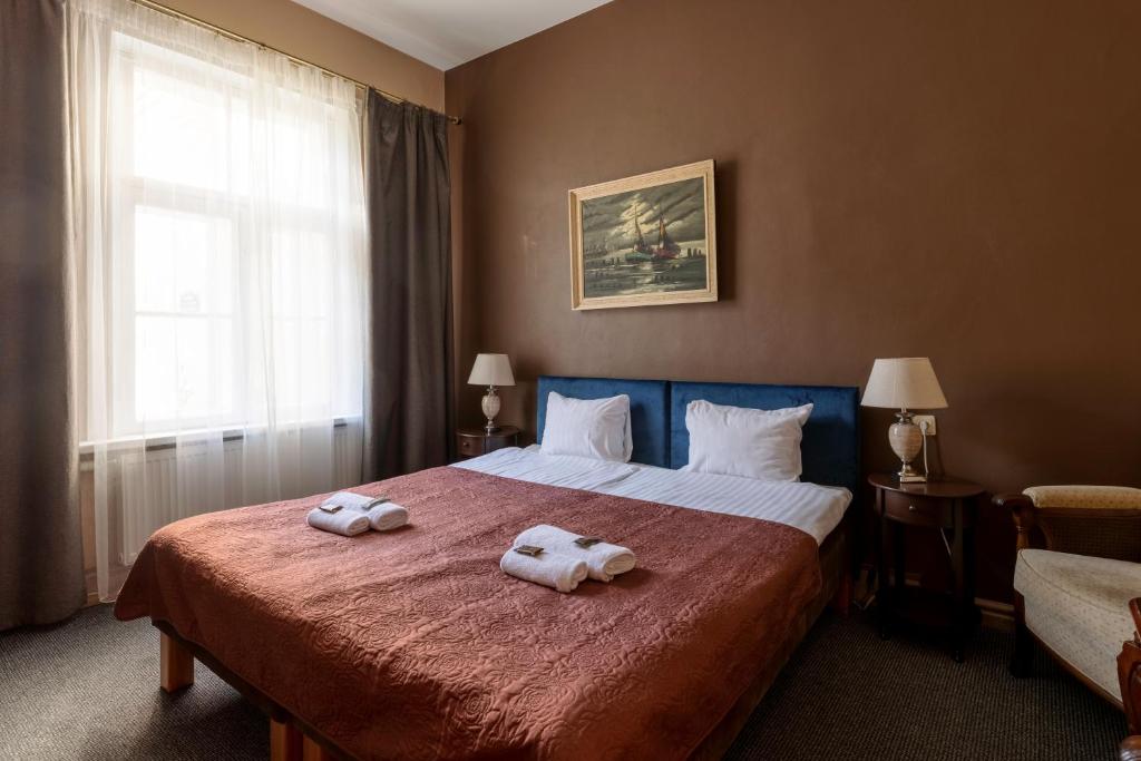 Двухместный (Стандартный двухместный номер с 1 кроватью или 2 отдельными кроватями) отеля Virkas Muiza, Кулдига