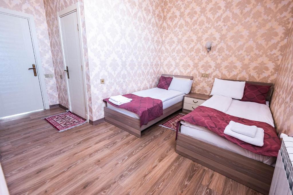 Двухместный (Двухместный номер с 2 отдельными кроватями и ванной комнатой) гостевого дома Дамла, Баку