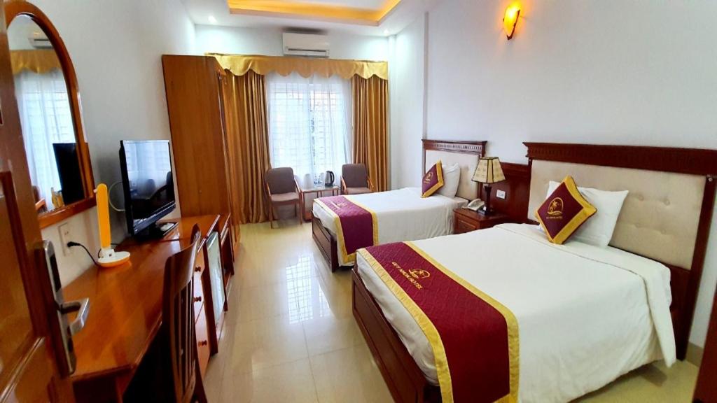 Двухместный (Двухместный номер Делюкс с 1 кроватью или 2 отдельными кроватями, вид на сад) отеля Quy Nhon Hotel, Куинён