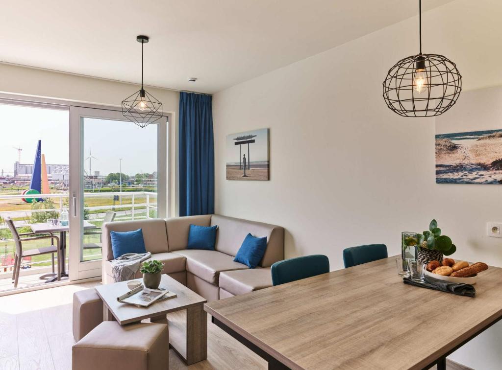 Четырехместный (Cosy Suite - 4p | 2 Sleeping corners | Balcony) апарт-отеля Holiday Suites Zeebrugge, Кнокке-Хейст