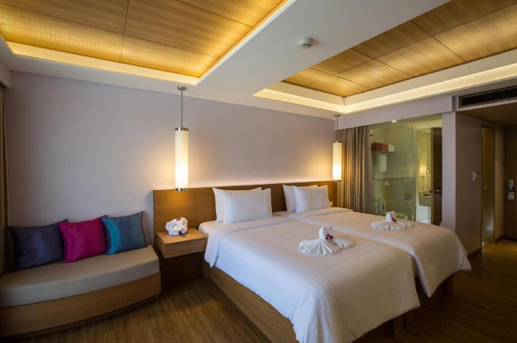 Двухместный (Двухместный номер Делюкс Beyond с 1 кроватью или 2 отдельными кроватями, вид на море) курортного отеля Beyond Resort Karon, Пхукет