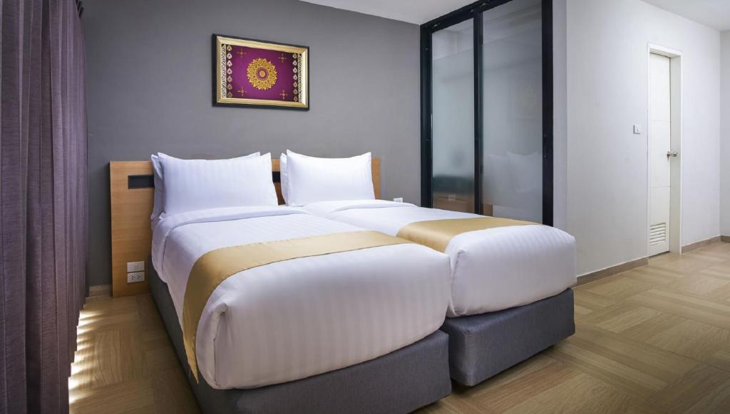 Сьюит (Двухместный люкс с 1 спальней с 2 отдельными кроватями) отеля Chiva Residence Bangkok, Бангкок