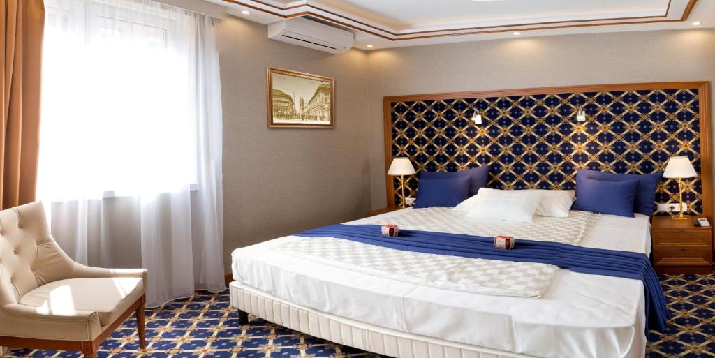 Двухместный (Улучшенный двухместный номер с 1 кроватью или 2 отдельными кроватями) отеля Hotel Central, Ньиредьхаза
