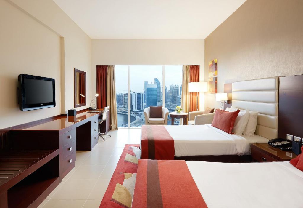 Двухместный (Стандартный двухместный номер с 2 отдельными кроватями) отеля M Hotel Downtown by Millennium, Дубай