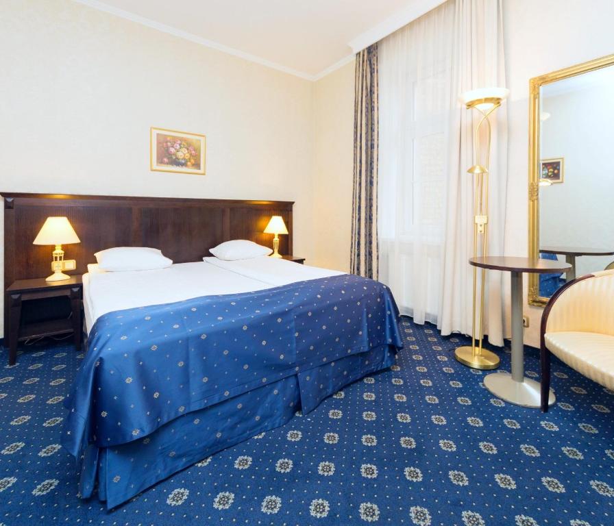 Двухместный (Стандартный двухместный номер с 1 кроватью или 2 отдельными кроватями) отеля Rixwell Gertrude Hotel, Рига