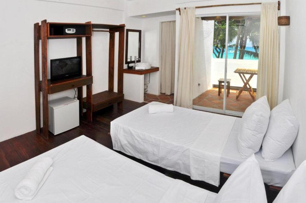 Двухместный (Стандартный двухместный номер с 2 отдельными кроватями) отеля Boracay Coco Huts, Боракай