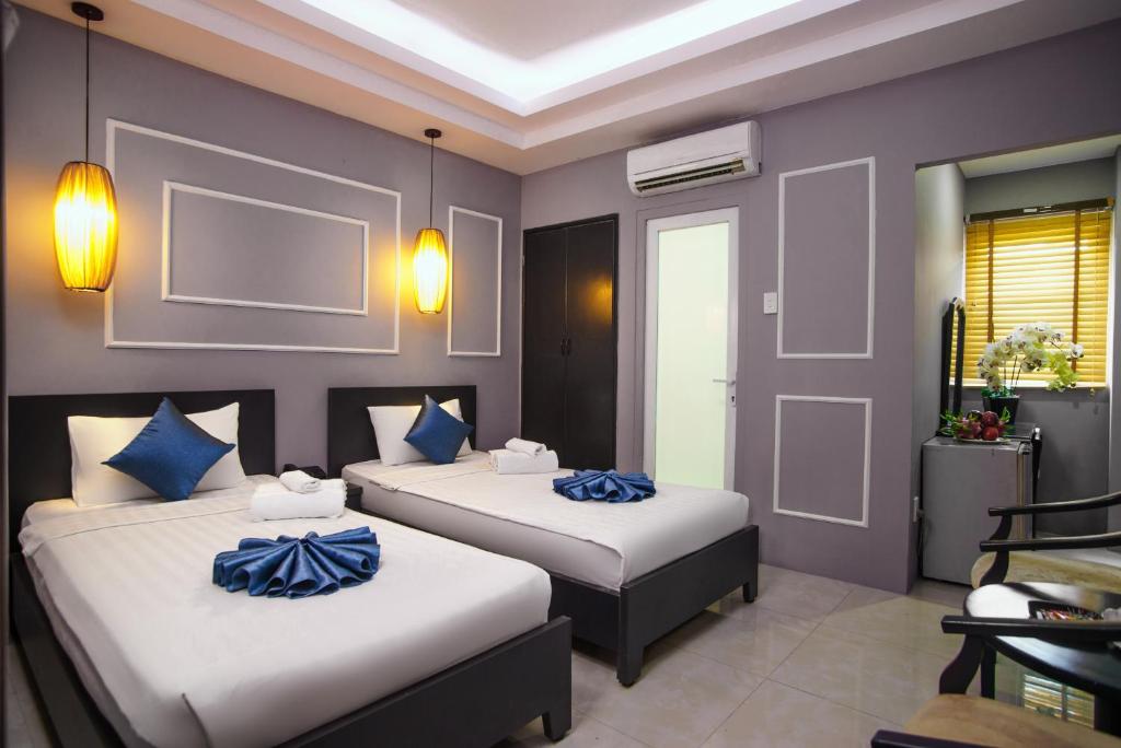 Двухместный (Двухместный номер Делюкс с 1 кроватью или 2 отдельными кроватями) отеля Hoang Lien Hotel, Хошимин