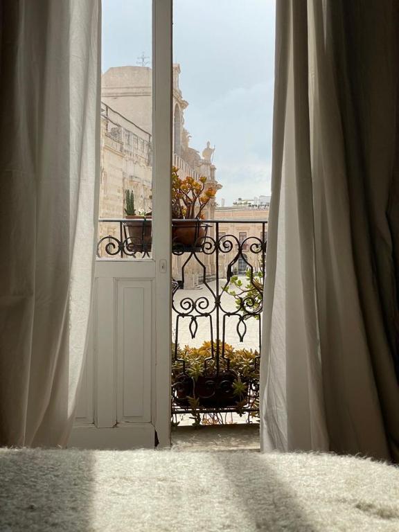 Двухместный (Улучшенный двухместный номер с 1 кроватью и хорошим видом) отеля Il Salotto di Maria Pia, Сиракузы