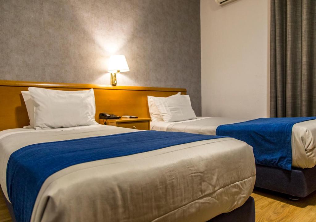 Двухместный (Двухместный номер с 2 отдельными кроватями) отеля Hotel Columbano, Ламегу