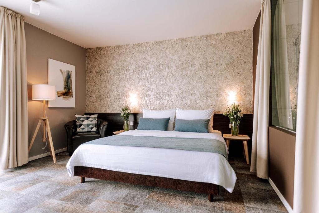 Двухместный (Улучшенный двухместный номер с 1 кроватью или 2 отдельными кроватями) отеля Hotel Spa Golfer - LifeClass Terme Sveti Martin, Свети-Мартин-на-Мури