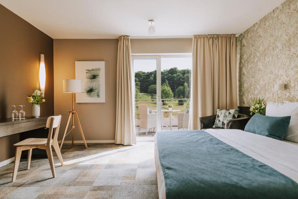 Двухместный (Premium Double/Twin Room with Terrace) отеля Hotel Spa Golfer - LifeClass Terme Sveti Martin, Свети-Мартин-на-Мури