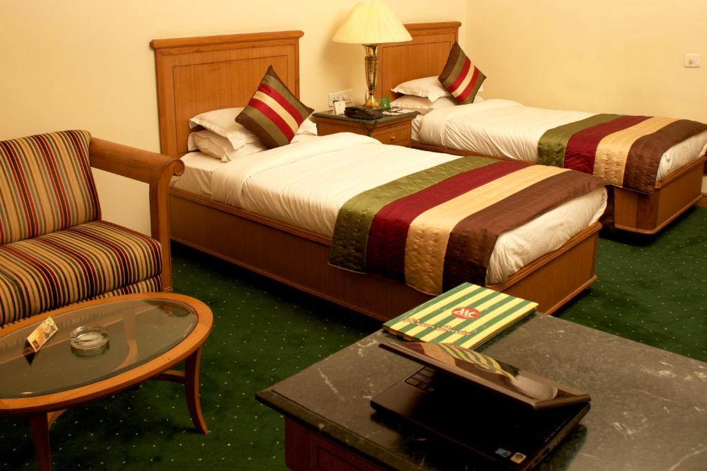 Двухместный (Двухместный номер Делюкс с 1 кроватью или 2 отдельными кроватями) отеля MK Hotel, Амритсар