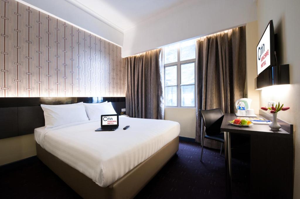 Двухместный (Улучшенный двухместный номер с 1 кроватью или 2 отдельными кроватями) отеля Citin Seacare Pudu by Compass Hospitality, Куала-Лумпур