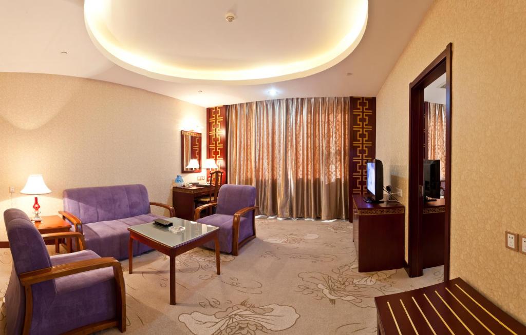 Двухместный (Двухместный номер бизнес-класса с 2 отдельными кроватями) отеля Bliss International Hotel, Вэйхай