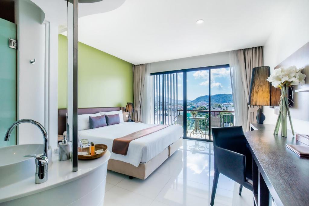 Двухместный (Двухместный номер Делюкс с 1 кроватью или 2 отдельными кроватями) отеля The Pago Phuket, Пхукет