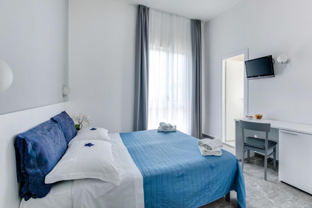 Двухместный (Двухместный номер с 1 кроватью или 2 отдельными кроватями и доступом на пляж) отеля Hotel Quisisana, Римини