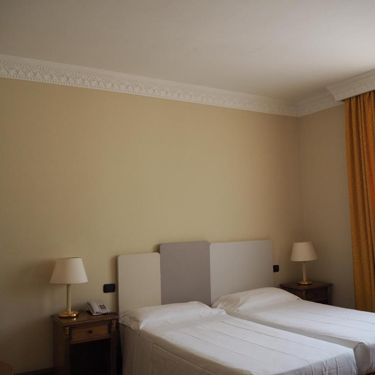 Двухместный (Улучшенный двухместный номер с 1 кроватью или 2 отдельными кроватями) отеля Katane Palace Hotel, Катания