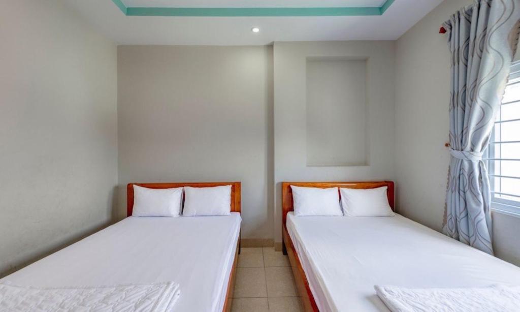 Четырехместный (Четырехместный номер) отеля Hoa Dan Hotel, Вунгтау
