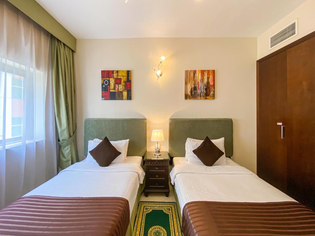Апартаменты (Представительские апартаменты с 2 спальнями и балконом) апарт-отеля Auris Boutique Hotel Apartments, Дубай