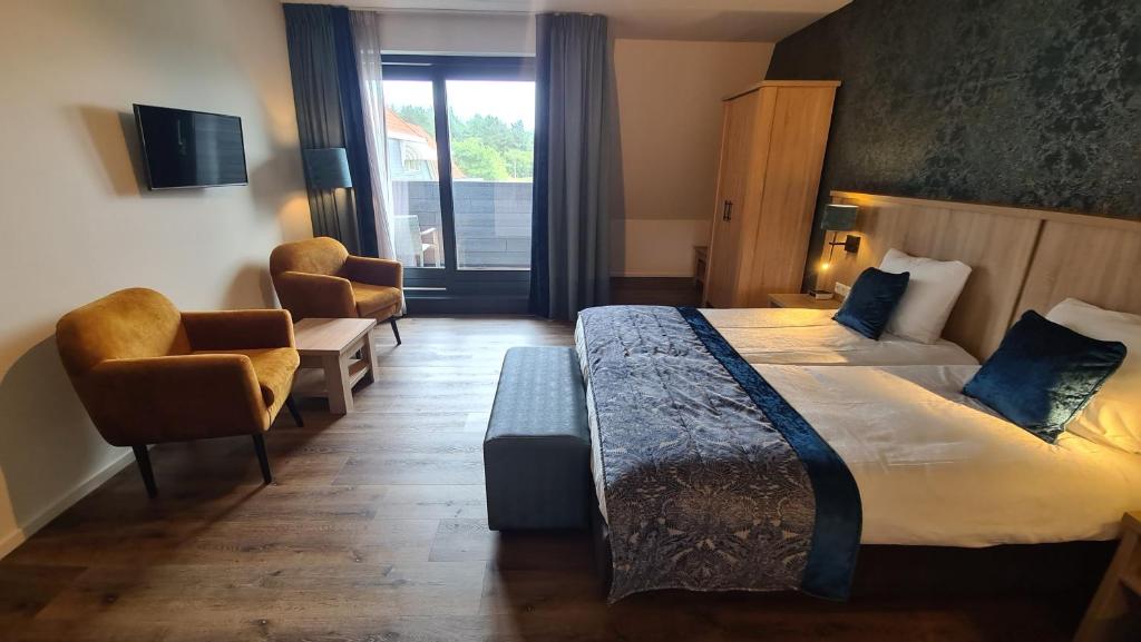Двухместный (Улучшенный двухместный номер с 1 кроватью и ванной) отеля Hotel Tatenhove Texel, Де-Коог
