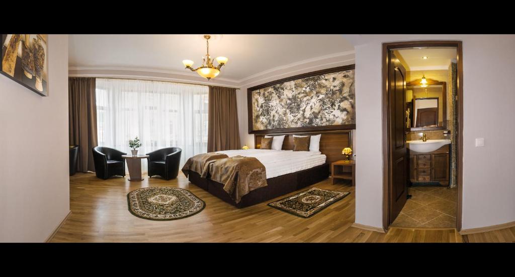 Двухместный (Улучшенный двухместный номер с 1 кроватью или 2 отдельными кроватями) отеля Hotel Bulevard Sighisoara, Сигишоара