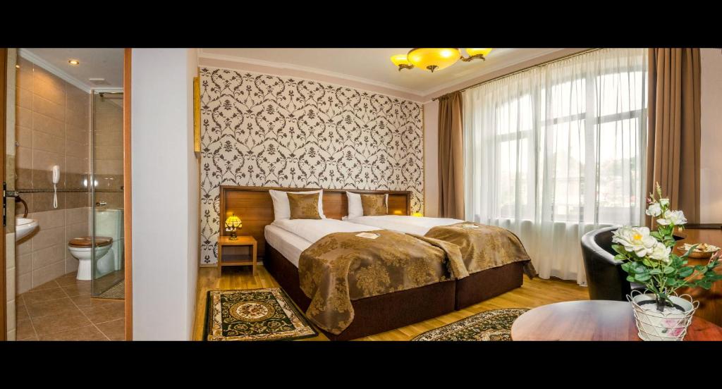 Двухместный (Стандартный двухместный номер с 1 кроватью или 2 отдельными кроватями) отеля Hotel Bulevard Sighisoara, Сигишоара