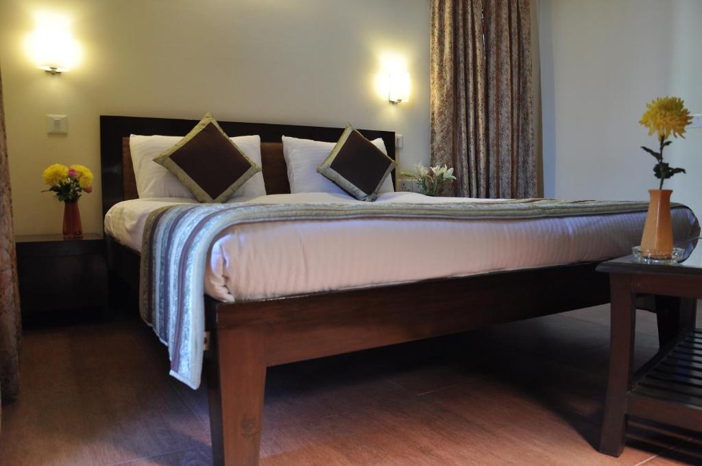 Двухместный (Улучшенный двухместный номер Делюкс с 1 кроватью или 2 отдельными кроватями) отеля Golden Palm Suites, Нью-Дели