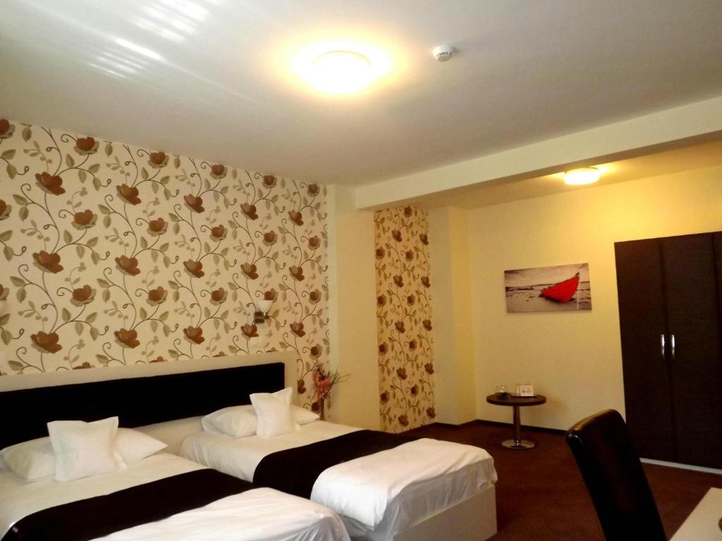 Двухместный (Двухместный номер с 2 отдельными кроватями) отеля West Plaza Residence, Бухарест