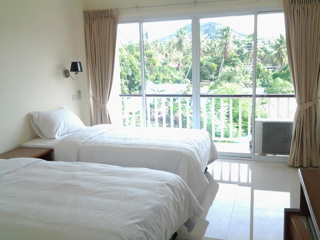 Двухместный (Двухместный номер Делюкс с 1 кроватью или 2 отдельными кроватями) гостевого дома Choengmon Residence, Самуи