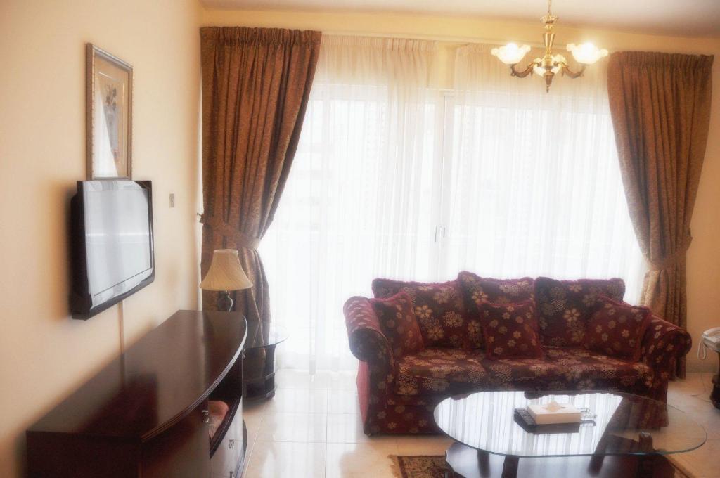 Апартаменты (Представительский люкс с 2 спальнями) апарт-отеля Royal Plaza Hotel Apartments, Дубай