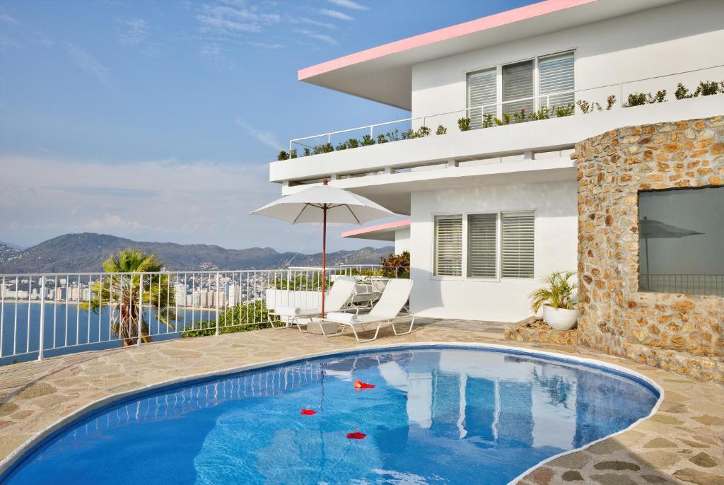 Двухместный (Коттедж с 2 кроватями и общим бассейном) отеля Las Brisas Acapulco, Акапулько-де-Хуарес