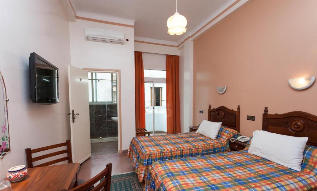 Двухместный (Двухместный номер с 1 кроватью или 2 отдельными кроватями) отеля Hôtel Astrid, Касабланка
