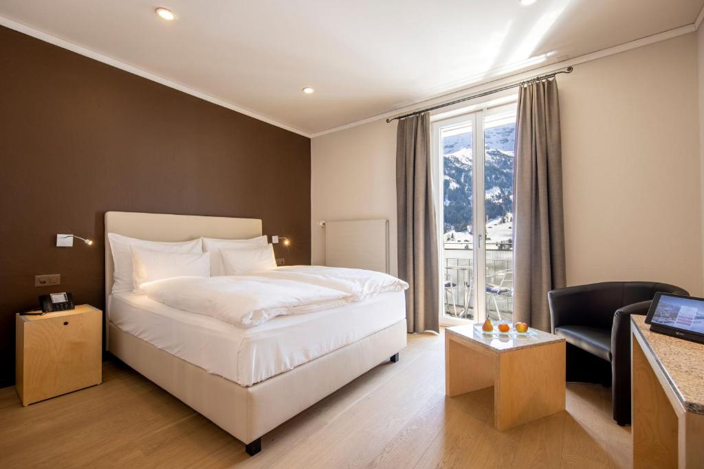 Двухместный (Стандартный двухместный номер с 1 кроватью и кондиционером — Вид на гору Эйгер) отеля Belvedere Swiss Quality Hotel, Гриндельвальд