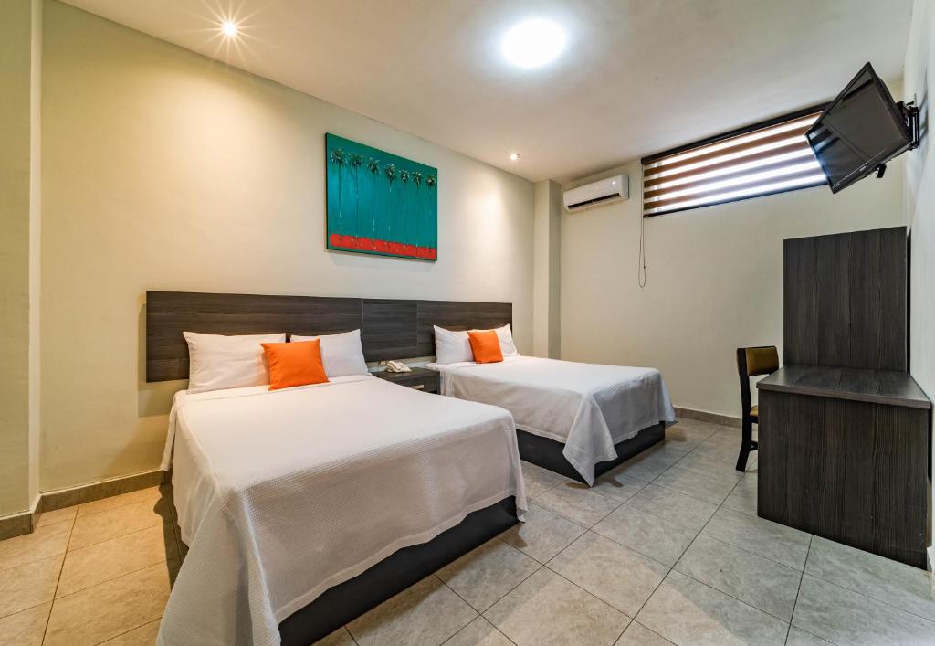 Двухместный (Двухместный номер с 2 отдельными кроватями) отеля Hotel La Perla, Торреон