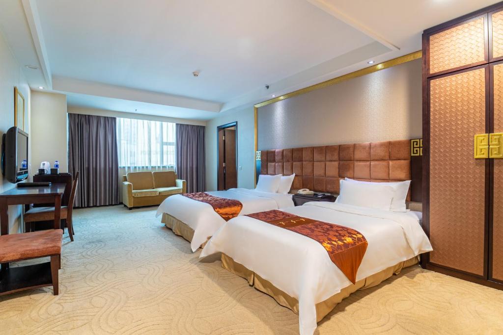 Двухместный (Улучшенный двухместный номер бизнес-класса с 2 отдельными кроватями) отеля Fortune Hotel, Гуанчжоу