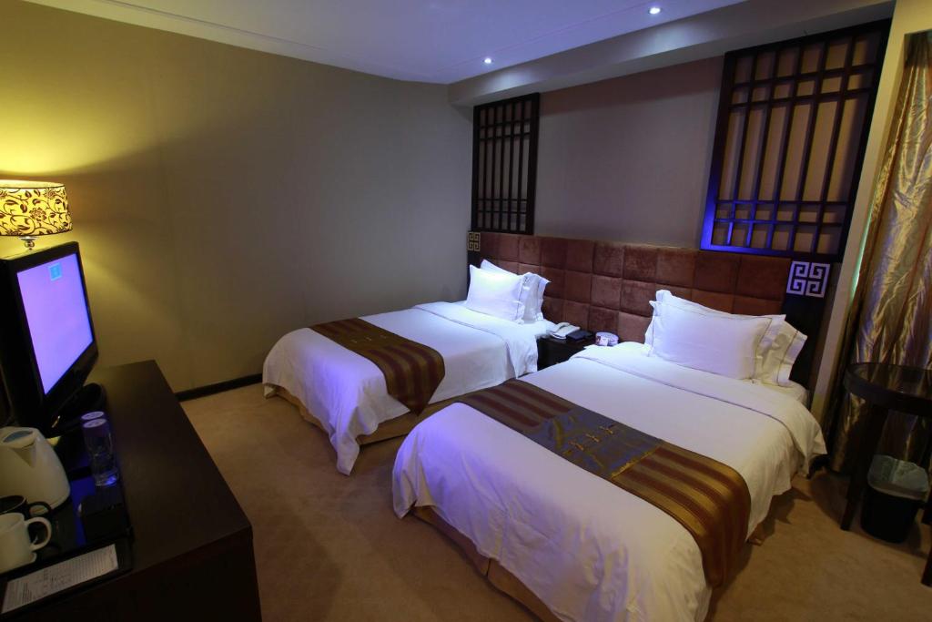 Двухместный (Двухместный номер бизнес-класса с 2 отдельными кроватями) отеля Fortune Hotel, Гуанчжоу