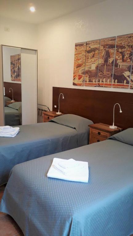 Двухместный (Двухместный номер с 1 кроватью или 2 отдельными кроватями и собственной ванной комнатой) гостевого дома L'Oasi al Pigneto - Guest house, Рим