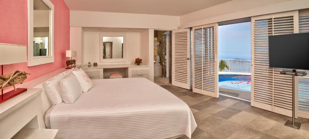 Двухместный (Коттедж с кроватью размера «king-size» и общим бассейном) отеля Las Brisas Acapulco, Акапулько-де-Хуарес