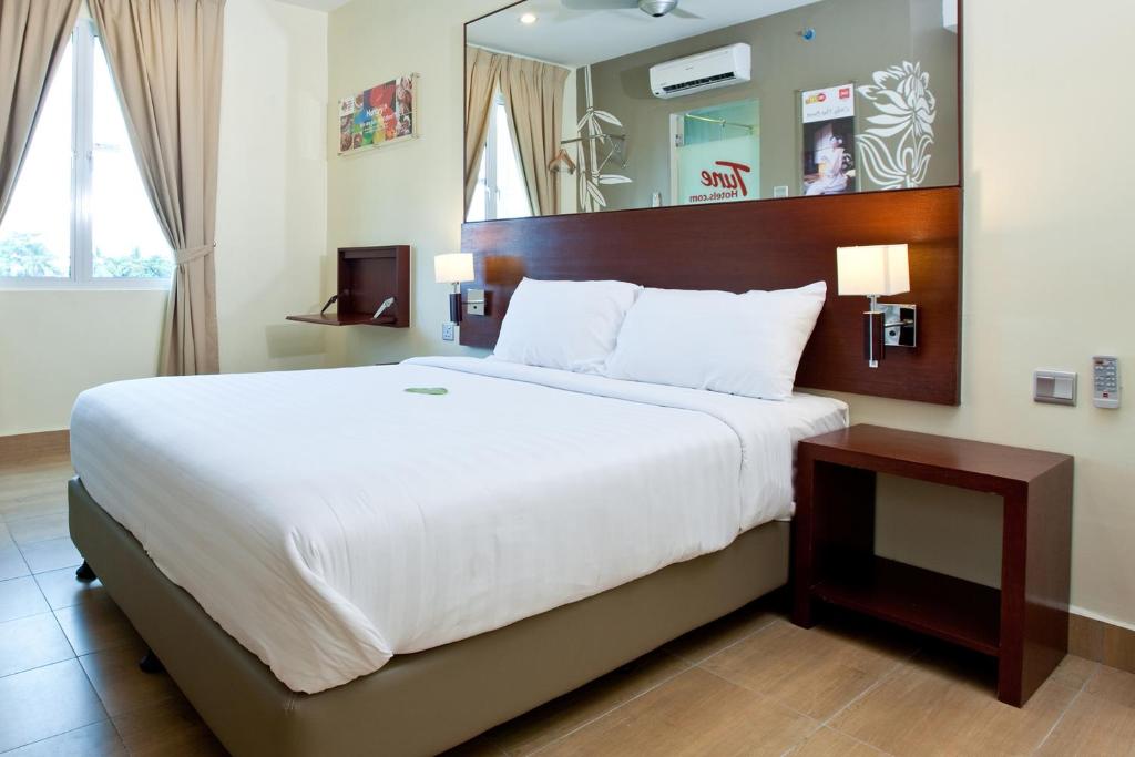 Четырехместный (Quad Room B) отеля Tune Hotel Georgetown Penang, Джорджтаун