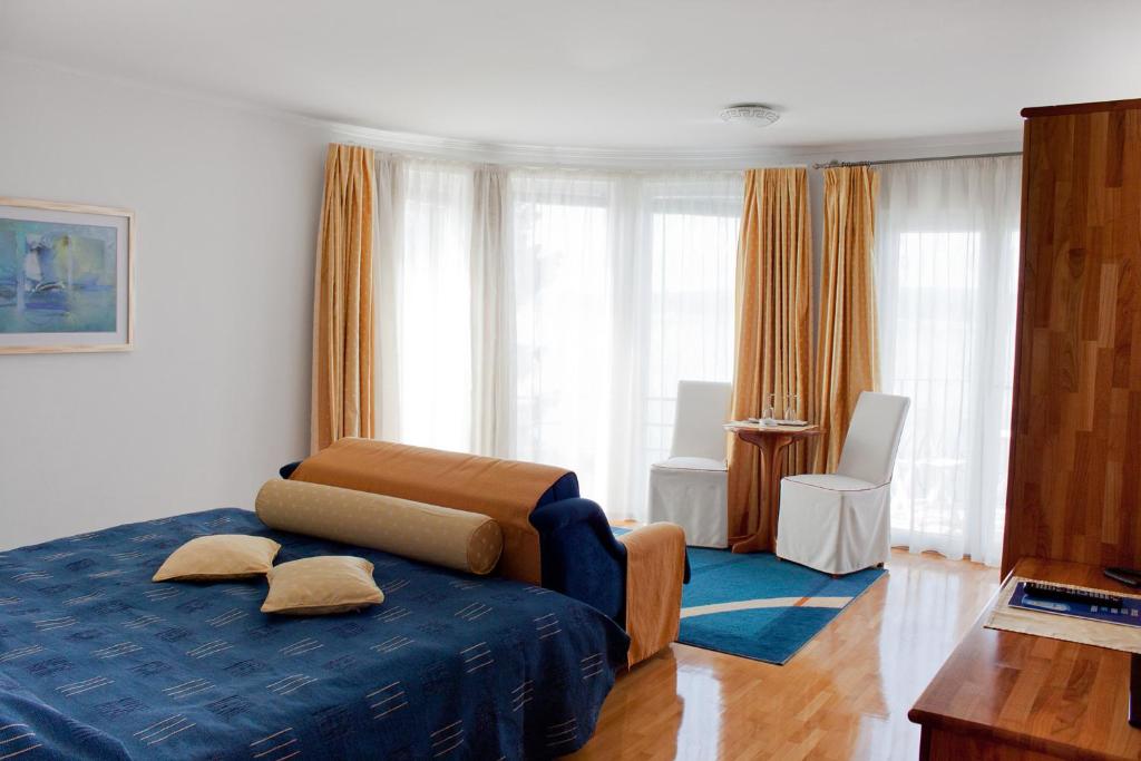Двухместный (Улучшенный двухместный номер с 1 кроватью и видом на море) отеля Hotel Vali, Драмаль