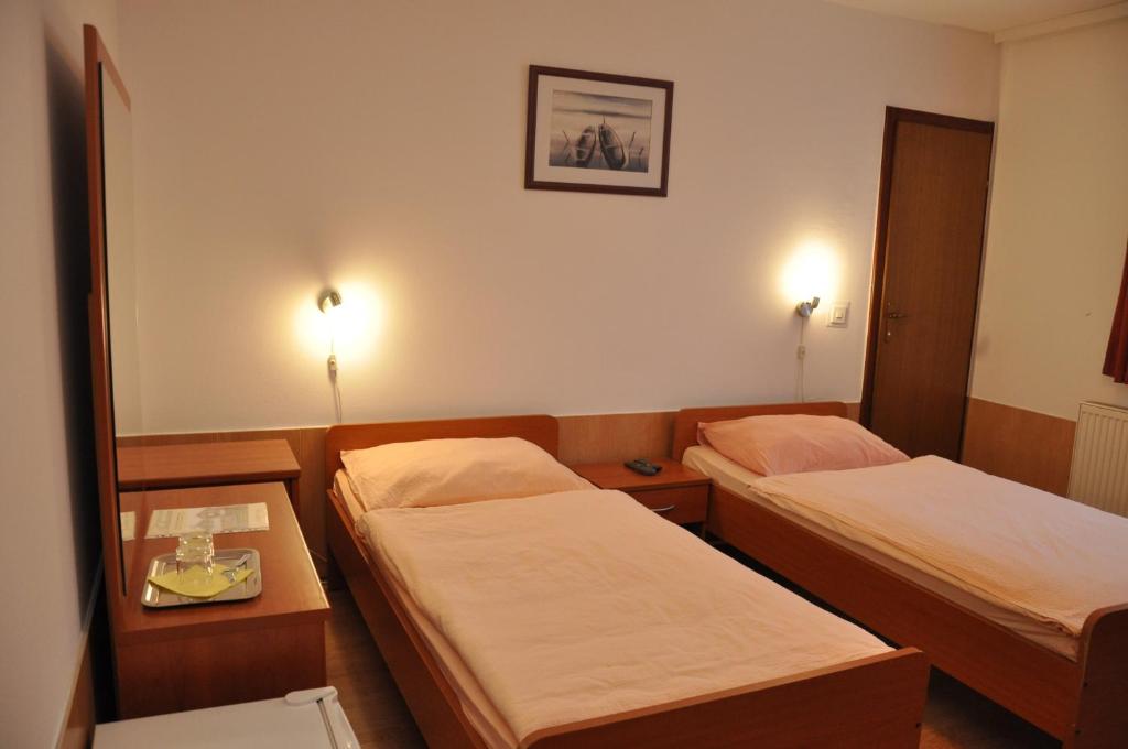 Двухместный (Двухместный номер с 2 отдельными кроватями) отеля Pansion Antonio, Славонски-Брод