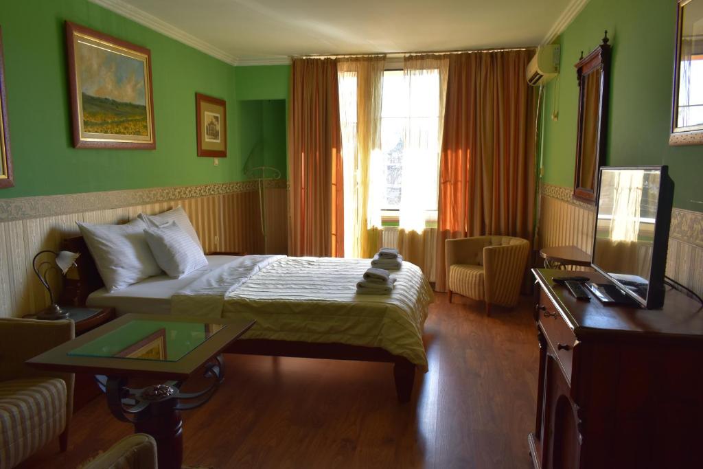 Двухместный (Двухместный номер с 1 кроватью или 2 отдельными кроватями) отеля Garni Hotel Garson-Lux NS, Нови-Сад