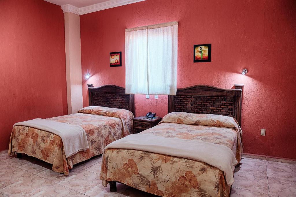 Двухместный (Двухместный номер с 2 двуспальными кроватями) отеля Hotel Suites Ejecutivas, Сьюдад-Мадеро