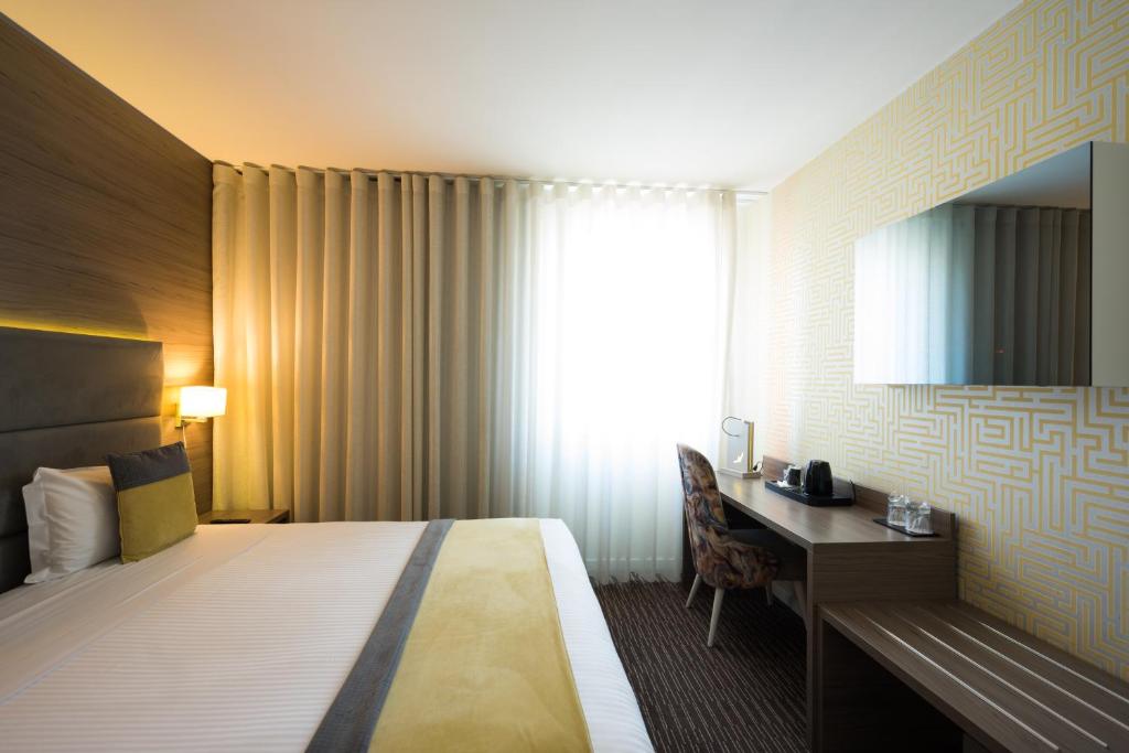 Двухместный (Улучшенный двухместный номер с 1 кроватью или 2 отдельными кроватями и видом на море) отеля Grande Hotel da Povoa, Повуа-ди-Варзин